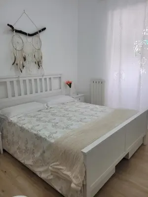 Letto o letti in una camera di CasaMaria
