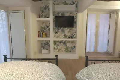 Letto o letti in una camera di La conchiglia Napoli