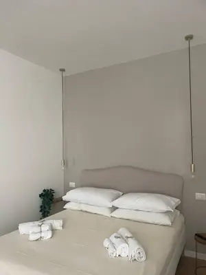 Letto o letti in una camera di Bugnato Residence