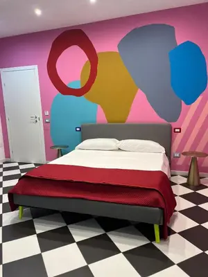 Letto o letti in una camera di Barrios Napoli