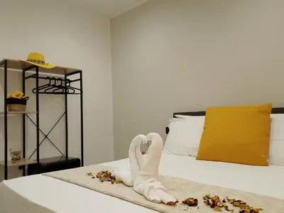 Letto o letti in una camera di Sweet Rooms San Francesco