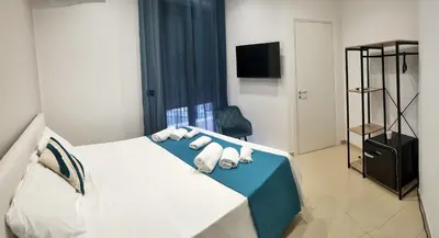 Letto o letti in una camera di Sweet Rooms San Francesco