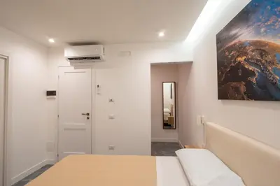 Letto o letti in una camera di La Maison di Tina