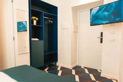 Letto o letti in una camera di Bovio apartment & rooms