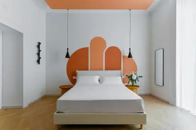 Letto o letti in una camera di Tarsia 42 Suites Napoli