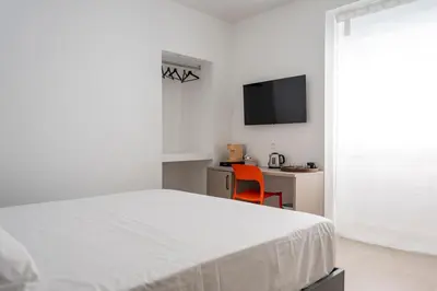 Letto o letti in una camera di Palazzo Santa Maria
