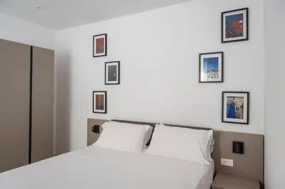 Letto o letti in una camera di Palazzo Santa Maria