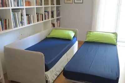 Letto o letti in una camera di Nea Parthenope apartment