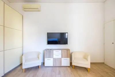 TV o dispositivi per l'intrattenimento presso Beverello Apartment