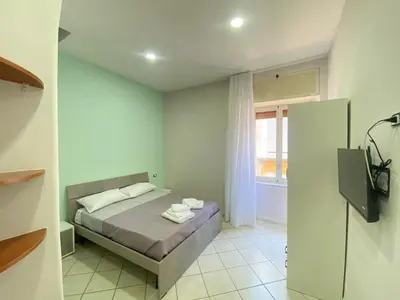 Letto o letti in una camera di Appartamento Orchidea