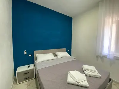 Letto o letti in una camera di Appartamento Orchidea