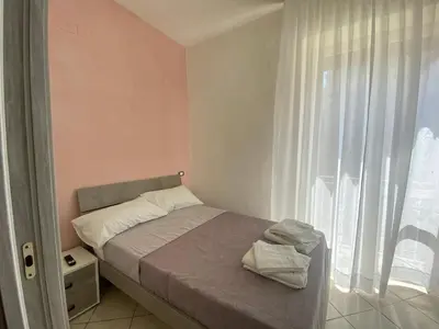 Letto o letti in una camera di Appartamento Orchidea