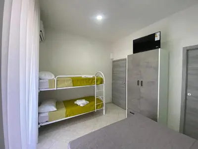 Letto o letti in una camera di Appartamento Orchidea