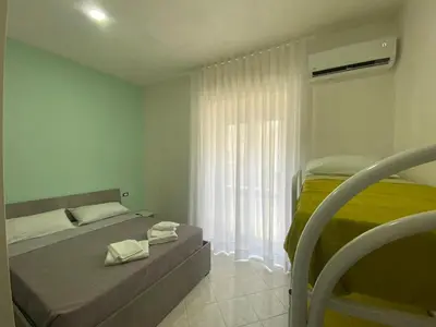 Letto o letti in una camera di Appartamento Orchidea