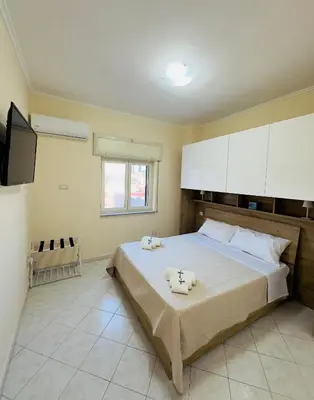 Letto o letti in una camera di La Casa di Apollo
