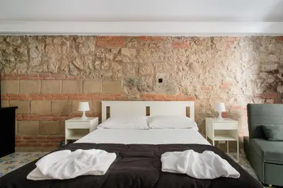 Letto o letti in una camera di Dimora Velato By Dimorra