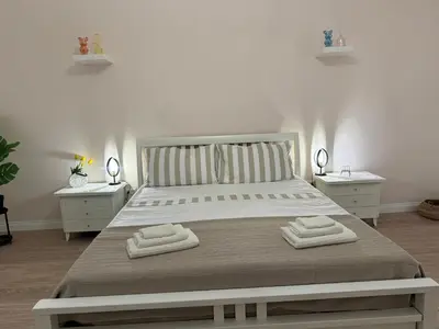 Letto o letti in una camera di Viktoria Fortunata