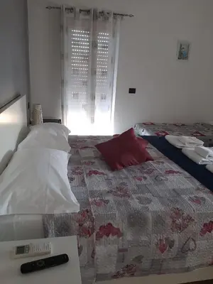 Letto o letti in una camera di B&B Locanda Mediterranea