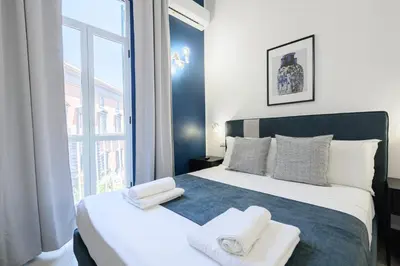 Letto o letti in una camera di Into Mann