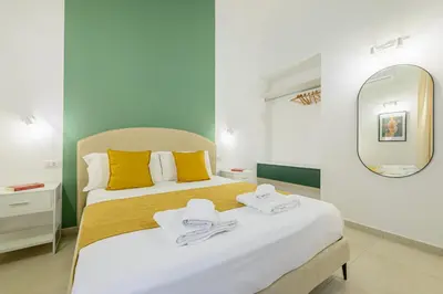Letto o letti in una camera di Into Mann