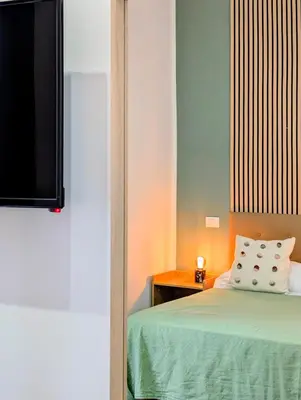 Letto o letti in una camera di Incoming Cesare Cortese