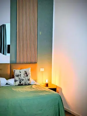 Letto o letti in una camera di Incoming Cesare Cortese