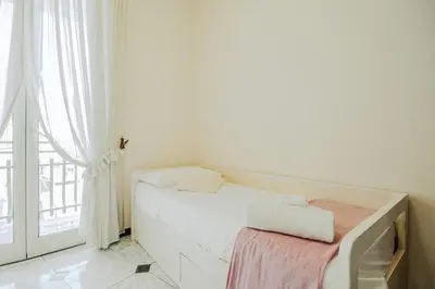 Letto o letti in una camera di Regina's Apartment