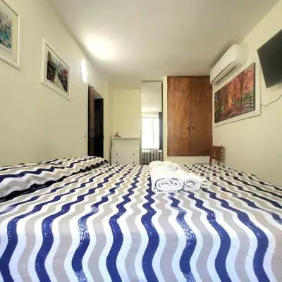 Letto o letti in una camera di Santa Chiara Attic , 4 floor no Elevator