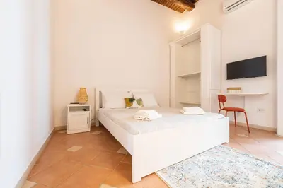 Letto o letti in una camera di Calaba Centro