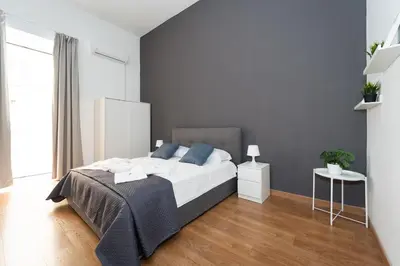 Letto o letti in una camera di Home Smart Rent Appartamento nel cuore di Napoli 1 camera da letto