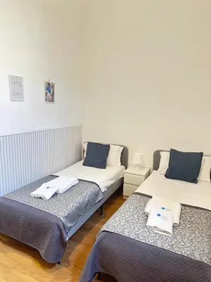 Letto o letti in una camera di Home Smart Rent Appartamento nel cuore di Napoli 1 camera da letto