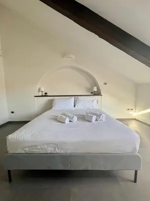 Letto o letti in una camera di Duomo Luxury Loft in the historic Center