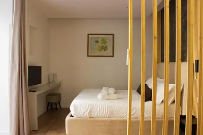 Letto o letti in una camera di the napolitaner