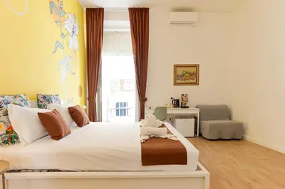 Letto o letti in una camera di Santa Patrizia a Chiaia Apartment