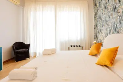 Letto o letti in una camera di Riviera di Chiaia 207