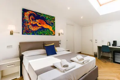 Letto o letti in una camera di Pessina 90 Rooms