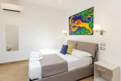 Letto o letti in una camera di Pessina 90 Rooms