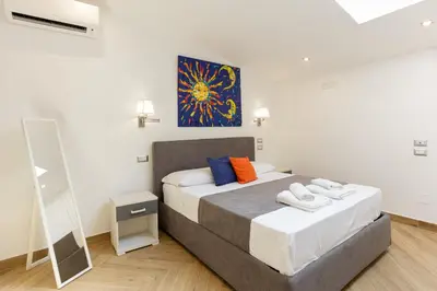 Letto o letti in una camera di Pessina 90 Rooms