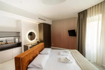 Letto o letti in una camera di Ypnos Rooms