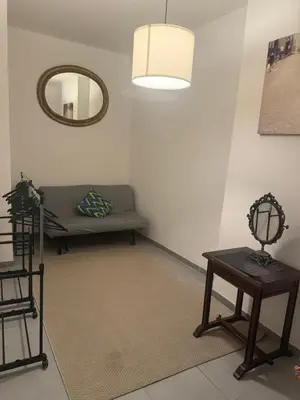 Area soggiorno di HV Suites DECUMANUS
