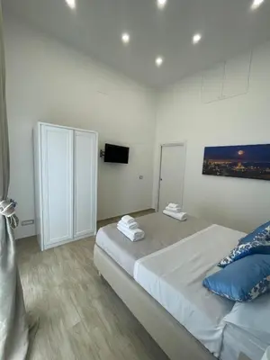 Letto o letti in una camera di Duomo Luxury Apartament