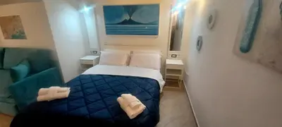 Letto o letti in una camera di Neapolis Mini Flat