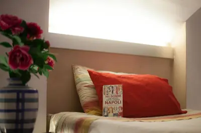 Letto o letti in una camera di Loft Piazza Trieste e Trento