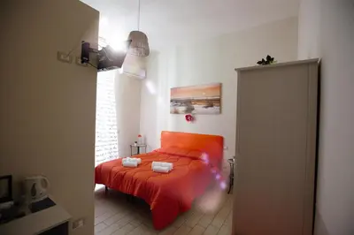 Letto o letti in una camera di Domus Armenio