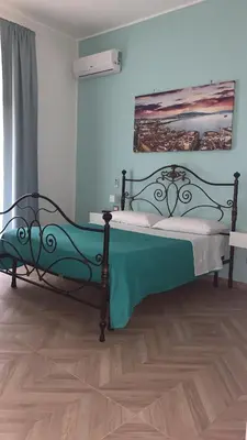 Letto o letti in una camera di A casa re nonni