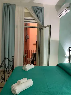 Letto o letti in una camera di A casa re nonni