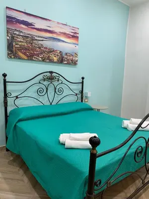 Letto o letti in una camera di A casa re nonni