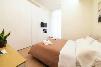 Letto o letti in una camera di Guli's Suite - Lusso e Comfort in Centro Storico