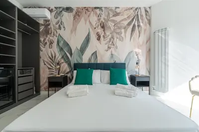Letto o letti in una camera di Atmosphera rooms