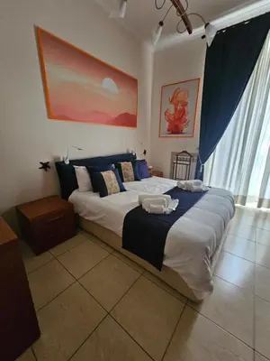 Letto o letti in una camera di Vomero Inn